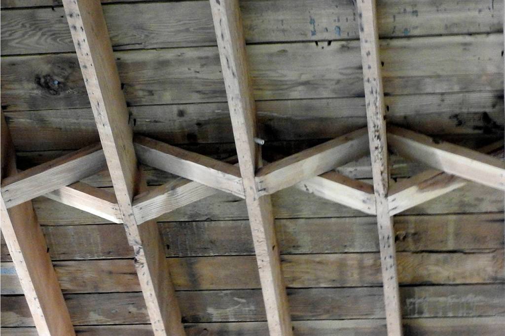 This beamwork, found hidden behind a drop-ceiling, was exposed and restored. (Photo by Kat Bryant | The Daily World)