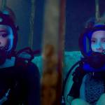 Lisa, played by Mandy Moore, left, and Kate, played by Claire Holt, are stuck on the ocean floor after their shark-diving excursion goes terribly wrong in &ldquo;47 Meters Down.&rdquo; (Entertainment Studios Motion Pictures)
