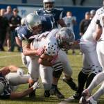 (Brendan Carl | The Daily World) Grays Harbor Bearcats&rsquo; Chris Cook wraps up the Cowlitz Cobras running back on Saturday.