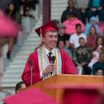 (Brendan Carl | The Daily World) Hoquiam valedictorian Christopher Smith speaks to his fellow classmates at Olympic Stadium on Friday night.