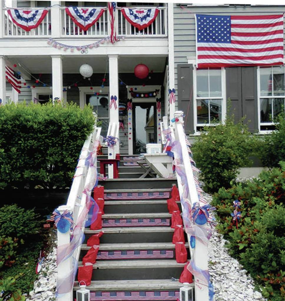 (File photo)                                The porches of Seabrook homes are decked out in red, while and blue for the Fourth of July every year.