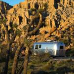 Charles Fleming and Julie Singer camp in an Airstream Bambi Sport at Red Rocks Canyon State Park. (Allen J. Schaben/Los Angeles Times)