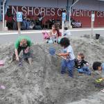 The kids&rsquo; sandpit at the Ocean Shores Convention Center was a popular spot at the 2016 Sand & Sawdust Festival. (Angelo Bruscas | GH Newspaper Group)