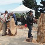 Chainsaw artists find the form of their creations as they begin to carve logs during the 2016 Sand & Sawdust Festival. (Angelo Bruscas | GH Newspaper Group)