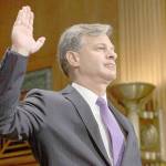 Alex Edelman/TNS                                Christopher Wray is sworn in by the Senate Judiciary Committee prior to his confirmation hearing to be FBI Director on July 12.