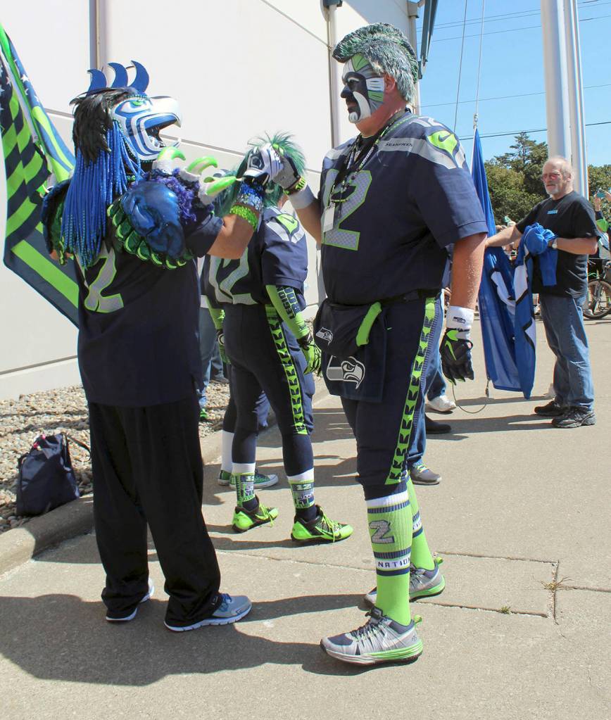 Angelo Bruscas/North Coast News: Seahawks superfans dress in game-day colors for the annual Fan Fest.