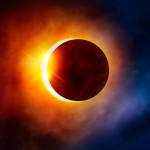 Dreamstime | TNS                                 With your solar glasses or a special viewer, watch for the partial phases of the eclipse as the moon passes over the sun, a stage that lasts for a few hours.