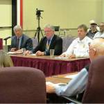 Scott D. Johnston photo Peter Moy and John Montanero of Financial Consulting Solutions Group and Ocean Shores Fire Chief David Bathke address the Ocean Shores City Council on Aug. 14 about a preliminary draft of a new ambulance utility rate study.