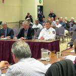 Scott D. Johnston photo Peter Moy and John Montanero of Financial Consulting Solutions Group and Ocean Shores Fire Chief David Bathke address the Ocean Shores City Council on Aug. 14 about a preliminary draft of a new ambulance utility rate study.