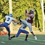 (Brendan Carl | For The Daily World) Montesano&rsquo;s Carson Klinger goes up to catch a touchdown pass against Elma during the Grays Harbor Football Jamboree on Friday night at Rottle Field.