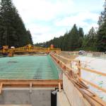 (Corey Morris | The Vidette) Rebar work is tied into place and readied over girders above the middle fork of Wildcat Creek. When weather conditions are right, a deck will be poured. The project will last two years.