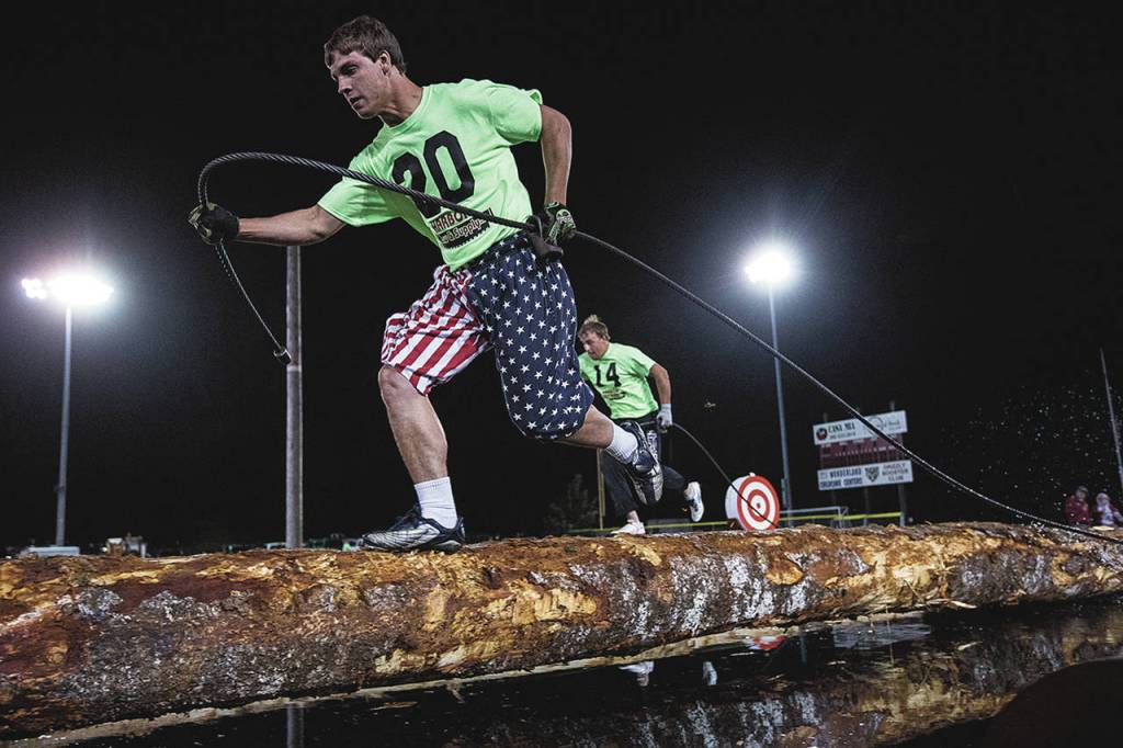 Gabe Green | The Daily World                                Jake Forrester sprints across the pond during the 2015 choker setting competition.
