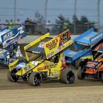 Brad Sweet (49) leads a group of sprints around the track at Grays Harbor Raceway. Sweet finished second in the main event on Monday. (Brendan Carl Photography)