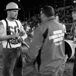 (Kat Bryant | The Daily World) Johnny Boggs, left, and Cody Stearns listen to instructions from Loggers Playday board member Josh Lennox on Saturday. Boggs was the 2017 local high-point logger.