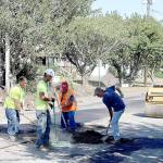 (Travis Rains | The Vidette) A Rognlin’s crew works together to tackle part of the reconstruction effort on East Pioneer Avenue just past the Montesano Fire station on Sept. 11.