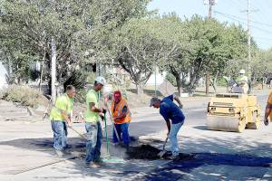 (Travis Rains | The Vidette) A Rognlin&rsquo;s crew works together to tackle part of the reconstruction effort on East Pioneer Avenue just past the Montesano Fire station on Sept. 11.