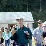 (Travis Rains | Grays Harbor Newspaper Group) John Henrikson tells the tour about beaver issues Wild Thyme has been having within their wildlife forest.