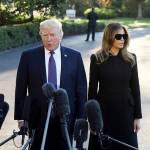 Olivier Douliery | Abaca Press                                 President Donald Trump, with First Lady Melania Trump, answers questions from the press as they depart the White House for Joint Base Andrews, en route to Las Vegas, on Wednesday.