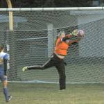 Ocosta goalie Kristi Raffelson makes a save against Adna on Monday afternoon. The Wildcats went on to win, 2-1. (Hasani Grayson | The Daily World)