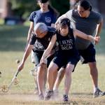 David Joles | Minneapolis Star Tribune                                 Sasha Houston Brown, center, battles for the ball during an evening of Creator&rsquo;s game, resembling lacrosse.