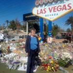 Local therapist Tobi Buckman stands by a memorial for the Las Vegas shooting victims.                                (Courtesy Tobi Buckman)
