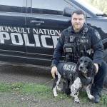 (Photo by Larry Workman) Corporal Tyler Warne with K9 Jeb.