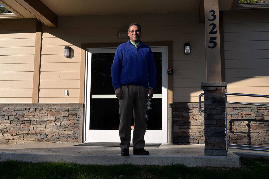 Hoquiam superintendent Mike Villarreal stands outside the districts newly built offices on Simpson Ave. He comes after spending years at the Othello school district. (Louis Krauss)
