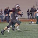 Montesanos Trevor Ridgway keeps the ball on an option play for a big gain Friday night at Rottle Field. (Brendan Carl Photography)