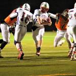 (Photo by Larry Bale) Peter Hamilton squirts through a hole on the way the end zone. He gained 96 yards on 21 carries.