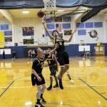 Aberdeen senior Jeshua Manwell goes in for a layup during a recent Bobcat practice. (Hasani Grayson | The Daily World)