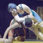 Bobcat boys, girls notch sweep in wrestling
