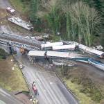 An Amtrak train derailed and fell off of a bridge and onto Interstate 5 near Mounts Road between Lakewood and Olympia on Monday. (Bettina Hansen/Seattle Times)