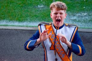 (Courtesy Karin Beard) Eric Beard conducts the Aberdeen High School marching band. Beard is one of 60 All-American drum majors invited to perform in the London New Years Day Parade.