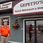 LOUIS KRAUSS | THE DAILY WORLD Gepettos owner Bob McEndoo stands outside the Montesano restaurant. Hes concerned about the financial toll a new $11.50 minimum wage will have on business.