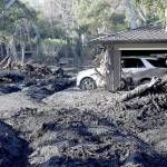 A deep layer of mud surrounds a badly damaged home along Hot Springs Road in Montecito, Calif., on Saturday. (Luis Sinco/Los Angeles Times)