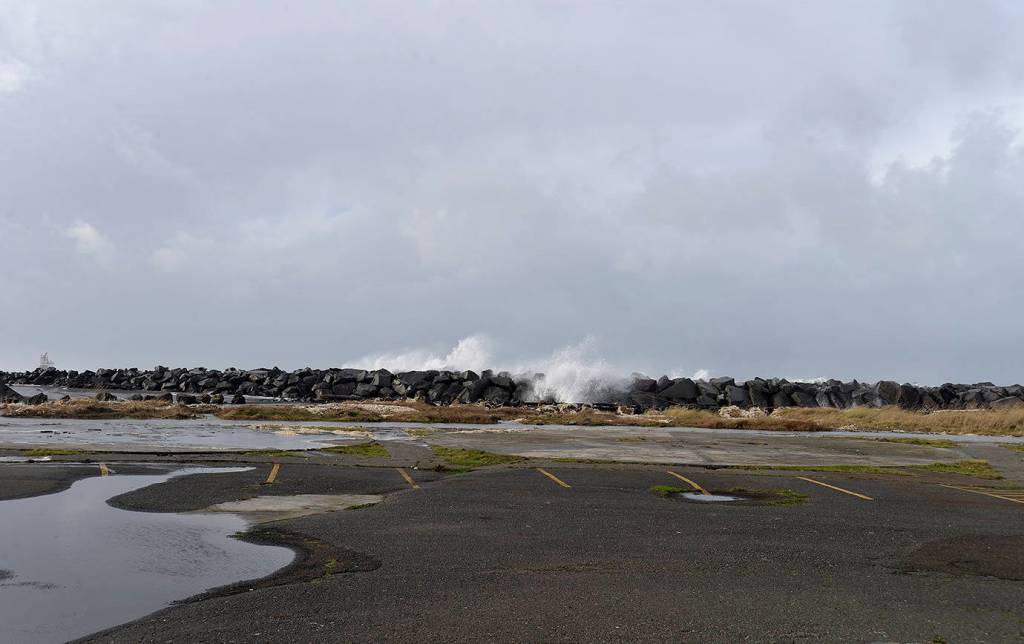 DAN HAMMOCK | THE DAILY WORLD                                Large waves battered the jetty in Westport Thursday.