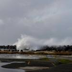 DAN HAMMOCK | THE DAILY WORLD                                 Waves tumble over the top of the Westport jetty, just west of the observation tower.