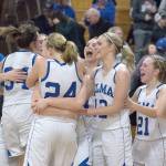Elma players celebrate after defeating Montesano, 60-50, in an Evergreen 1A League contest on Thursday night. With the victory, the Eagles brought Montesanos 53-game league winning streak to an end. See story and more photos in Sports. (Brendan Carl Photography)