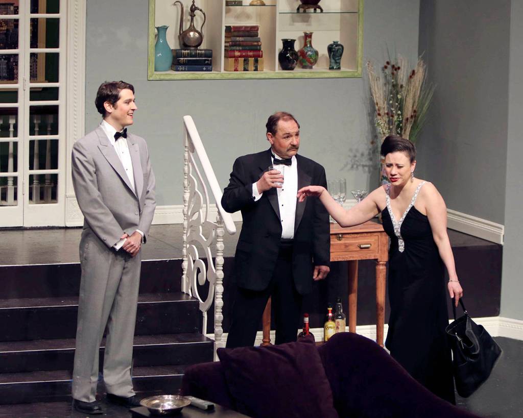 (Photo by Keith J. Krueger) From left: Gus, the hired help (Jeff Rockwell), and James Wicker (Jeff Ryser), a Hollywood star, meet Virginia Noyes (Sara Henry), the star of the play.