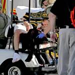 Medical personnel tend to a victim outside of Stoneman Douglas High School in Parkland, Fla. after reports of an active shooter on Wednesday, Feb. 14, 2018. (John McCall/Sun Sentinel/TNS)