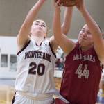 Montesanos Zoee Lisherness and Hoquiams Maddie German battle for a rebound during a District IV 1A tournament game on Wednesday. (Brendan Carl Photography)