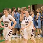 Montesano players make an emotional walk off the court as Freeman celebrates on Saturday. (Brendan Carl Photography)