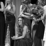 Photo by Keith J. Krueger                                2017 Outstanding Teen Paicyn Dragoo places the crown on 2018 winner Mercedes Morrill at the annual pageant.