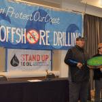 LOUIS KRAUSS | THE DAILY WORLD Willie Frank III and Hweqwidi Hanford Mccloud, both from the Nisqually Tribe, perform a song at Mondays event in Olympia to oppose offshore drilling.