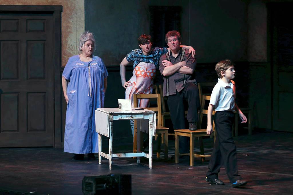 (Photo by Keith J. Krueger) Billy (Justyce Brook) walks away as his family (played, from left, by Debbie Scoones, Casey Bronson and Gary Morean) watch.