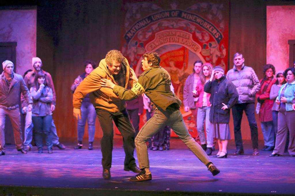 (Photo by Keith J. Krueger) Tony (Casey Bronson, right) confronts Billys father (Gary Morean) at the union hall.