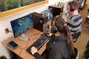 (Courtesy Ralph Hogaboom) Kass Lopez, president of the Grays Harbor Esports Club, plays League of Legends, along with Malachi Richards. The clubs tournament will be this Saturday at 7 p.m. at the college.
