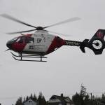 DAN HAMMOCK | THE DAILY WORLD                                A helicopter from Northwest Airlift takes off from the soccer field near Aberdeen High School Monday morning. Just prior an Aberdeen student playing the role of a seriously injured car crash was placed aboard, part of the Every 32 Minutes program to teach young people about the impact of impaired driving.