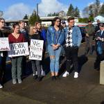 LOUIS KRAUSS | THE DAILY WORLD Aberdeen High School senior Nadia Wirta, far right, addresses the crowd during Wednesdays walkout to protest gun violence. Approximately 75 students participated, as did some in other schools around Grays Harbor.