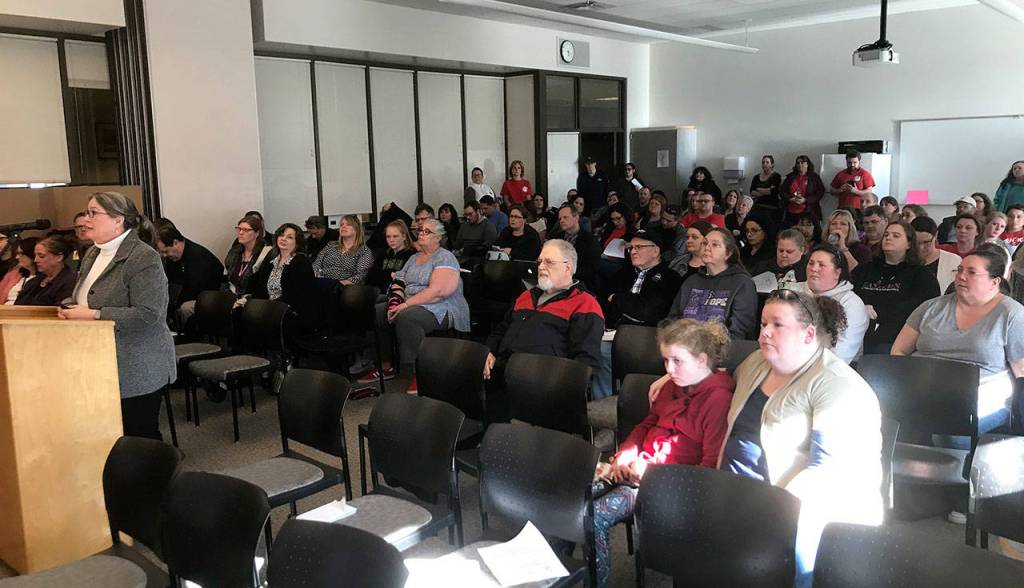 LOUIS KRAUSS | THE DAILY WORLD Community members listen to Superintendent Alicia Henderson discuss the options to reduce K-3 class sizes at Tuesdays Aberdeen School Board meeting.